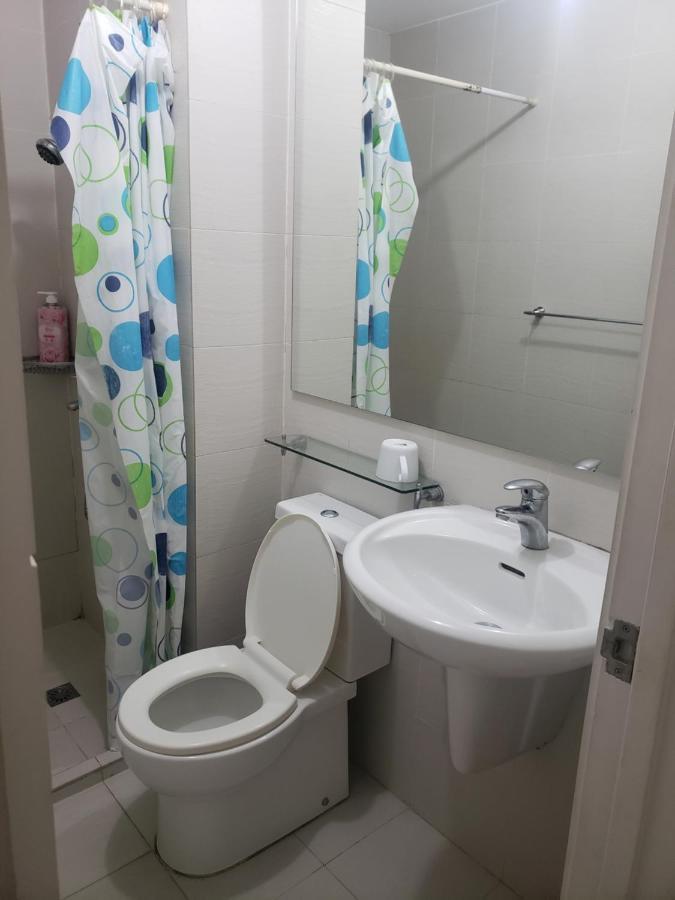 Sutherland Tower Acqua Private Residences 曼达卢永 外观 照片