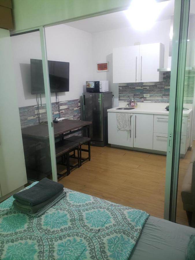 Sutherland Tower Acqua Private Residences 曼达卢永 外观 照片